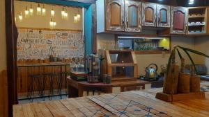 Una cocina o kitchenette en The Host Puerto Iguazú