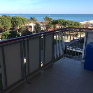a balcony with a view of the ocean at Studio in Porto Santa Margherita 40284 in Porto Santa Margherita di Caorle