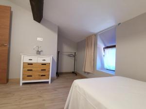 En eller flere senge i et værelse på La Casina del Trasgu + 2 billeder