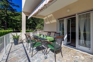 Balkón nebo terasa v ubytování Apartments in Moscenicka Draga 34827 + 10 fotografií
