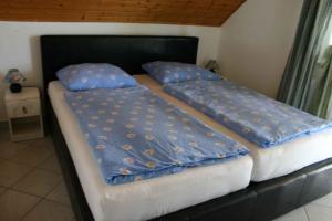 Posteľ alebo postele v izbe v ubytovaní Holiday home Cserszegtomaj/Balaton 39729 + 20 fotografií