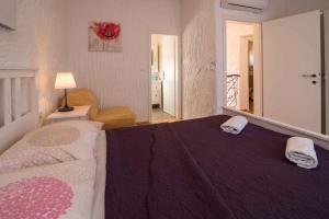 Łóżko lub łóżka w pokoju w obiekcie Holiday home in Risika - Insel Krk 38433
