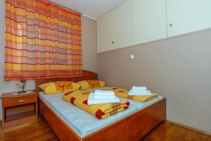 Posteľ alebo postele v izbe v ubytovaní Apartment in Dramalj 41531