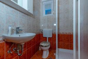 Kúpeľňa v ubytovaní Apartment in Dramalj 41531