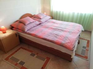 Posteľ alebo postele v izbe v ubytovaní Holiday home in Balatonfenyves 38430