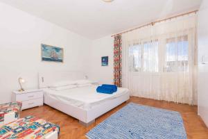 Posteľ alebo postele v izbe v ubytovaní Apartment in Crikvenica 38031