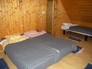 Säng eller sängar i ett rum på Holiday home in Fonyod/Balaton 38001