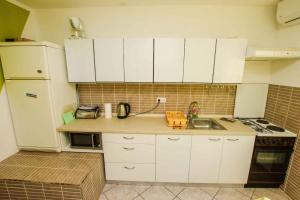 Kuchyň nebo kuchyňský kout v ubytování Apartment in Porec - Istrien 33166