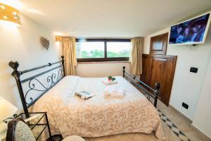 Posteľ alebo postele v izbe v ubytovaní Holiday home Montefiascone - Latium 30408