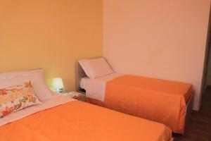 Postel nebo postele na pokoji v ubytování Messapia Casa Vacanze