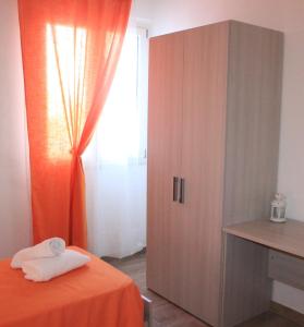 Postel nebo postele na pokoji v ubytování Messapia Casa Vacanze