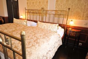 Postel nebo postele na pokoji v ubytování Gutshaus Kubbelkow