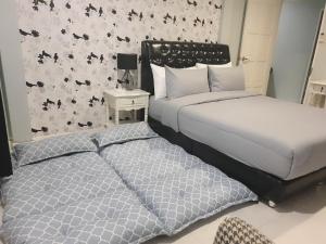 Postel nebo postele na pokoji v ubytování Little home poolvilla