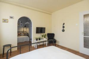 Posteľ alebo postele v izbe v ubytovaní Hősök Apartman