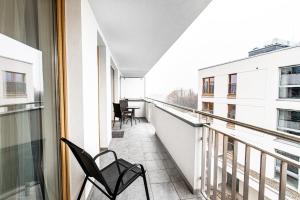 Balkón alebo terasa v ubytovaní Bella Casa Premium Apartment - 30 Pszczelna