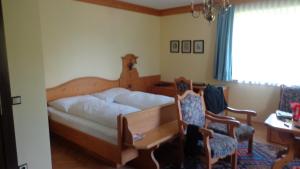 Letto o letti in una camera di Hotel Restaurant - Häuserl im Wald Graz