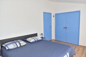 Posteľ alebo postele v izbe v ubytovaní Apartments Piero