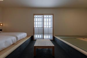 Llit o llits en una habitació de yubune