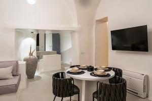 TV a/nebo společenská místnost v ubytování Terra e Lavoro Luxury Suite