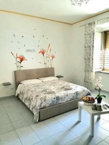 Cama o camas de una habitación en Le tre orchidee