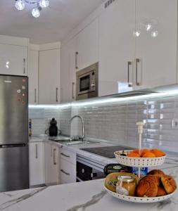 A kitchen or kitchenette at El Dorado Sun Las Américas by Vapagó Tenerife