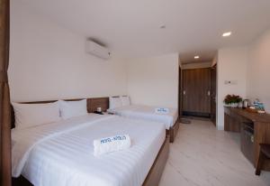 Postel nebo postele na pokoji v ubytování HoTel APOLLO VACATION