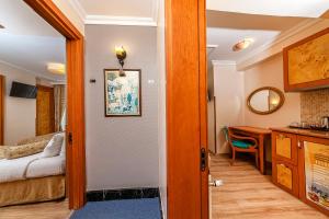 Postel nebo postele na pokoji v ubytování Santa Ottoman Hotel