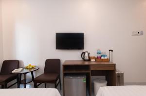 TV a/nebo společenská místnost v ubytování HoTel APOLLO VACATION