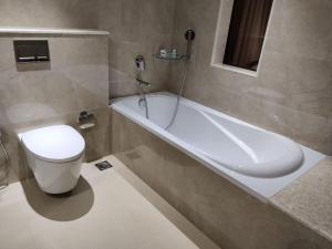 Kylpyhuone majoituspaikassa Issacs Residency