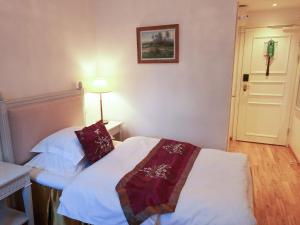 Postel nebo postele na pokoji v ubytování Brommavik Hotel