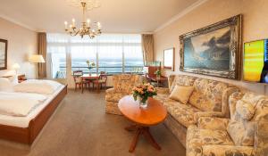 Postel nebo postele na pokoji v ubytování Strandhotel Monbijou GmbH garni