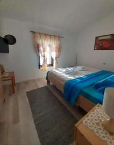 Krevet ili kreveti u jedinici u okviru objekta BellaVistaZmukic Guesthouse