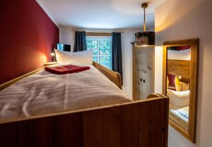 Postel nebo postele na pokoji v ubytování Berghotel Bärenstein