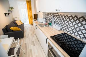 Posedenie v ubytovaní Hey Stay Apartment with private garden