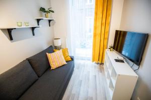 Гостиная зона в Hey Stay Apartment with private garden