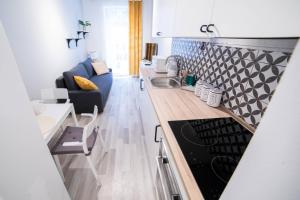 Posedenie v ubytovaní Hey Stay Apartment with private garden