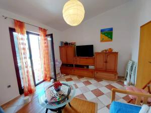 Televisyen dan/atau pusat hiburan di Apartment Pepo Pag