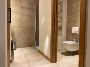 Kúpeľňa v ubytovaní Dolomeet Boutique Hotel