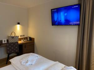 Posteľ alebo postele v izbe v ubytovaní Dolomeet Boutique Hotel