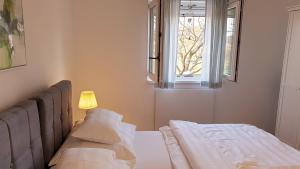Postel nebo postele na pokoji v ubytování Ferienhaus Rovinj mit Pool + 37 fotografií