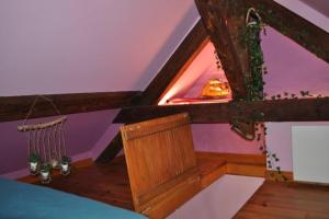 Un pat sau paturi într-o cameră la Une escale à l'Écluse