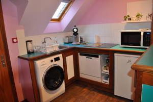 O bucătărie sau chicinetă la Une escale à l'Écluse +7 fotografii