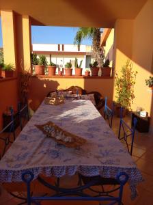 Balkón nebo terasa v ubytování Casa Bon' Aria fronte mare sud Sardegna (P1899)
