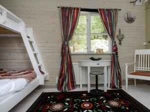Katil atau katil-katil dalam bilik di Kolmårdsgården B&B
