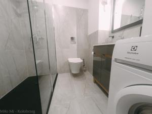 Kúpeľňa v ubytovaní MiłoMi Apartamenty Kołobrzeg
