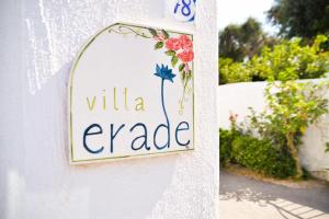a sign that reads villa expaza on a wall at Villa Erade in Ischia