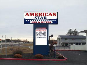 a sign for an american star inn and suites at American Star Inn & Suites Atlantic City in Galloway +5 photos