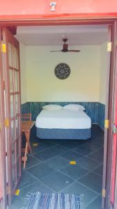 Ліжко або ліжка в номері Chales Terra Pura