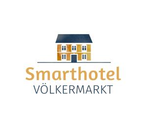 a house with the words smartford volksmark on it at Smarthotel Völkermarkt in Völkermarkt