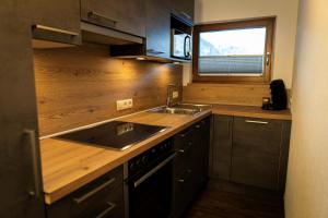 Kuchyň nebo kuchyňský kout v ubytování Landhaus Steinmüller + 17 fotografií